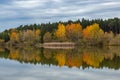 Forest lake in cloudy, autumn weather. Late fall. Europe Royalty Free Stock Photo