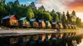 Forest lush and row of colorful wooden houses at the beach Royalty Free Stock Photo