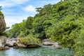 Forest meeting with rocks and the sea in Trindade, Paraty