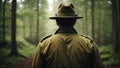 Forest ranger with green hat walking through wooded landscape and inspecting national park, generative ai