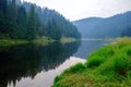 The forest reflected in the Lochsa River near Syringa, Idaho, USA