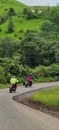 Forest road mountain cloud rainwaterfall bikes looking clouds beauty rider taking photo