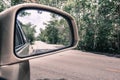 Forest Road in Side view mirror Royalty Free Stock Photo