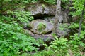 Forest scene with large rock crevice along hiking trail at Algonquin Park Royalty Free Stock Photo