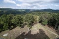 Forest and shadow of castle on the meadow Royalty Free Stock Photo