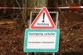 Forest. Text in German: Logging. Acces denied. Forestry work - danger to life. Royalty Free Stock Photo
