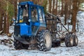 Forest tree tractor vehicle winter snow outdoor with nobody Royalty Free Stock Photo