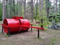 Logging Cabin Green leaves tall trees vegetation forest woods trunks branches