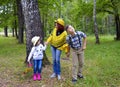 Forest trees nature autumn friends together daughter kids group baby running young love smiling woman happiness fun father boy chi Royalty Free Stock Photo