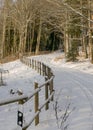 Forest in winter after heavy snowfall. Winter landscape, a day in a winter forest with freshly fallen snow, a country road with a Royalty Free Stock Photo