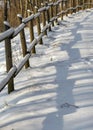 Forest in winter after heavy snowfall. Winter landscape, a day in a winter forest with freshly fallen snow, a country road with a Royalty Free Stock Photo