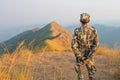 Forester or forest ranger hiking in the mountains at Khao Chang Puak mountain Thailand