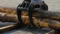 A forestry machine loads a log truck at the site landing. Forest machine down logs Royalty Free Stock Photo