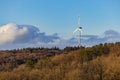 Forests in front of a wind turbine for sustainable power generation in Hohenlohekreis, Germany Royalty Free Stock Photo