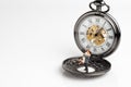 Forever love timeless concept by miniature people couple standing on vintage pocket watch, seamless white background