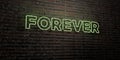 FOREVER -Realistic Neon Sign on Brick Wall background - 3D rendered royalty free stock image