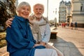 Forever with You. Portrait of happy and beautiful senior couple in casual clothes holding hands and looking at camera Royalty Free Stock Photo