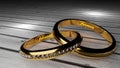 Orever yours - golden wedding rings joined together forever with engraved and gloving words