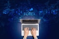 Forex trading concept with person using laptop Royalty Free Stock Photo