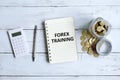 Forex training written on a notebook Royalty Free Stock Photo