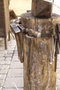 Forge and blacksmith tools at a market stall Royalty Free Stock Photo