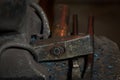 Creating iron tools in blacksmith`s on the old plank wood table Royalty Free Stock Photo