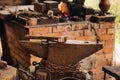 Forge, hammer on an anvil standing on the street Royalty Free Stock Photo