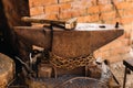 Forge, hammer on an anvil standing on the street Royalty Free Stock Photo
