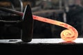 Forge, production workshop. Blacksmith tools and hot metal. Royalty Free Stock Photo