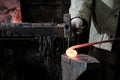 Forge, production workshop. Blacksmith tools and hot metal.