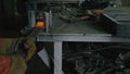 Forge workshop on table. Smithy manual production. Work on the product. Ruler, angle grinder. The blacksmith manufacture Royalty Free Stock Photo