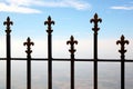 Forged gate against the blue sky Royalty Free Stock Photo
