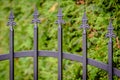 Forged iron fence grey painted metal Royalty Free Stock Photo