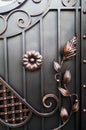 Forged items decorating modern metal gates