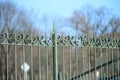 Forged metal fence of the Park on the sky background Royalty Free Stock Photo