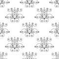 Forged seamless pattern of black fleur-de-lis on a white background. Openwork metal fence design. Modern style for Royalty Free Stock Photo