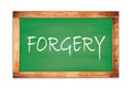 FORGERY text written on green school board
