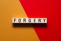 Forgery word concept on cubes