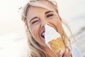 Forget the diamonds, ice cream is a girls best friend. a young woman enjoying ice cream outdoors. Royalty Free Stock Photo