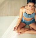 Forget the diet, live the lifestyle. a young woman doing yoga.