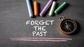Forget the past written on the chalk board Royalty Free Stock Photo