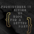 Forgiveness is giving up hope for a better past - Beautiful Quote About forgiveness with black textured background