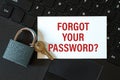 Forgot your password - the inscription on the card and the lock on the background of the keyboard