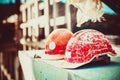 Forgotten builder helmet lying on a concrete block on the blurry background Bridge construction at day light