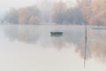 A forgotten fishing boat in the tributary of the Danube Royalty Free Stock Photo