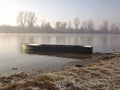 A forgotten fishing boat in the tributary of the Danube Royalty Free Stock Photo