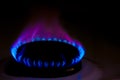 Forgotten gas burner, burning in the darkness without supervision