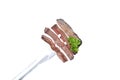 Fork with beef steak slices isolated on white background Royalty Free Stock Photo