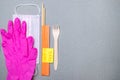 Fork, chopsticks, medical mask, latex gloves and a sticker covid-19 free Royalty Free Stock Photo
