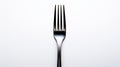 High Contrast Close-up Of Fork On White Surface Royalty Free Stock Photo
